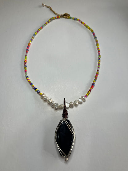 Worm Hole Pendant Beaded Necklace